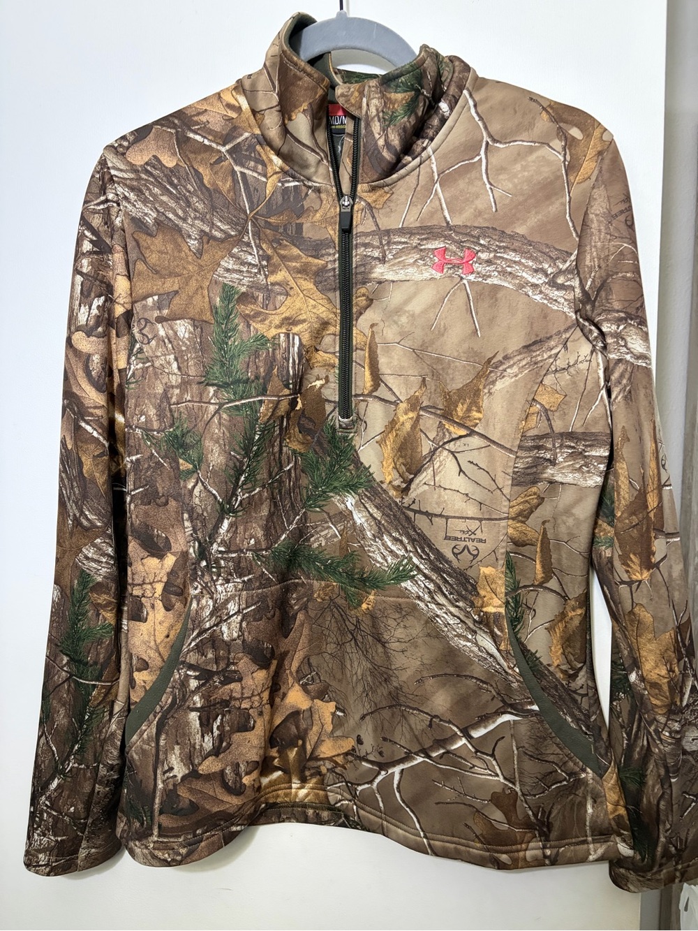 Women’s under Armour tree camo, semi fitted zip jacket, medium